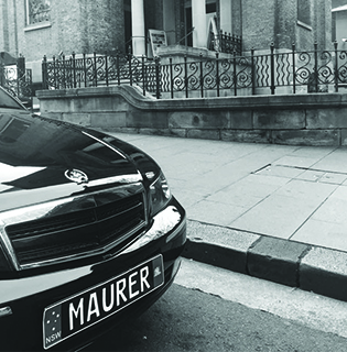 A Maurer funeral car, black and white photograph